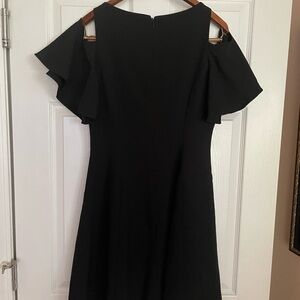 Little black dress with cutout sleeves